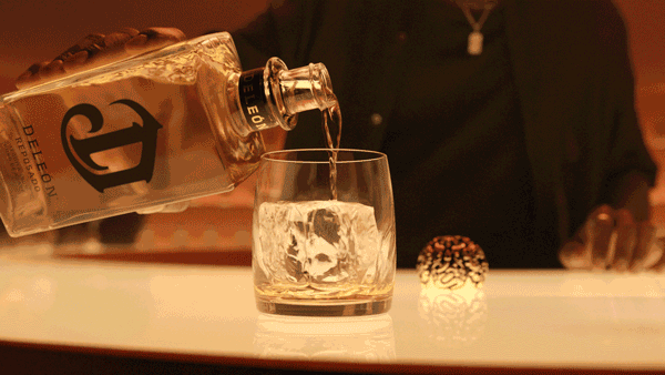 Pouring Deleon Tequila